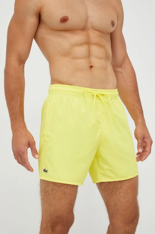 Ανδρικά Σόρτς Σορτς κολύμβησης Lacoste κίτρινο 1 Ανδρικά Σόρτς Σορτς κολύμβησης Lacoste κίτρινο